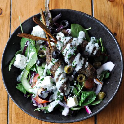 Lamb kofta salad with whipped feta and olives