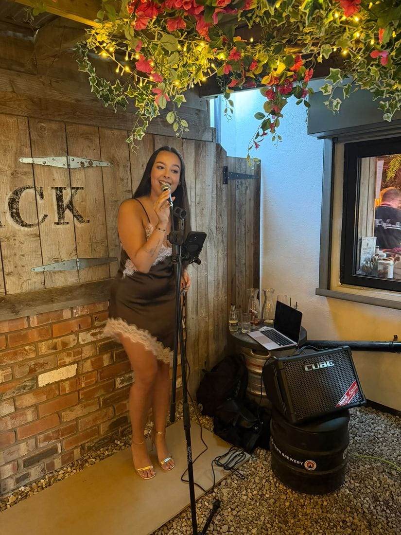 Live music under the pergola at a private event
